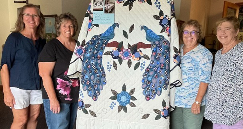 Court 481 fundraiser with Peacock Applique Quilt