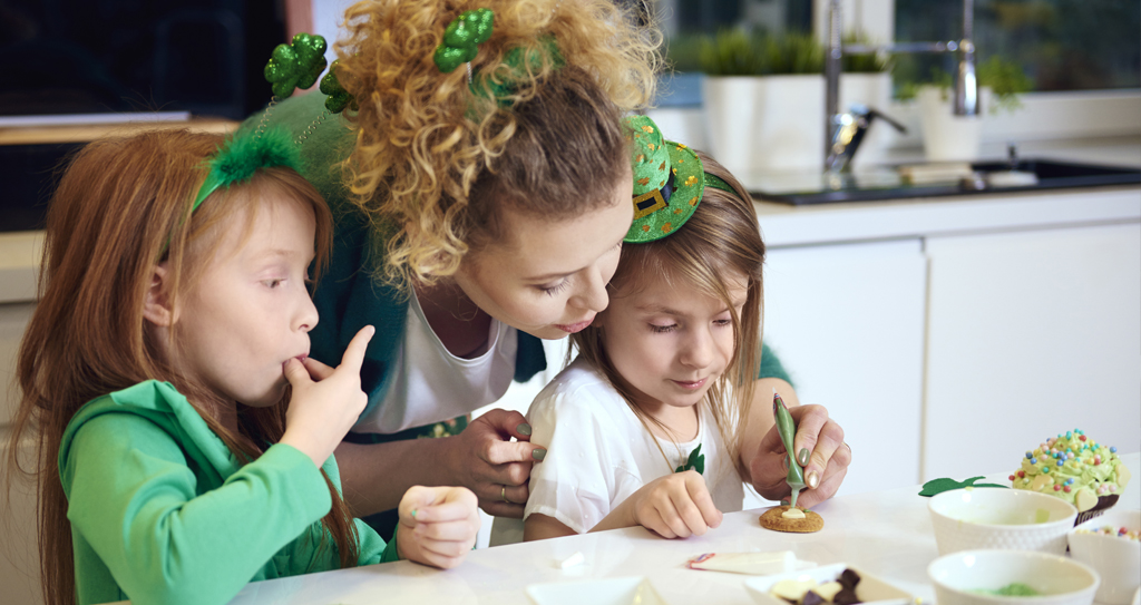 Festive in green and making cookies to celebrate St. Patrick's Day