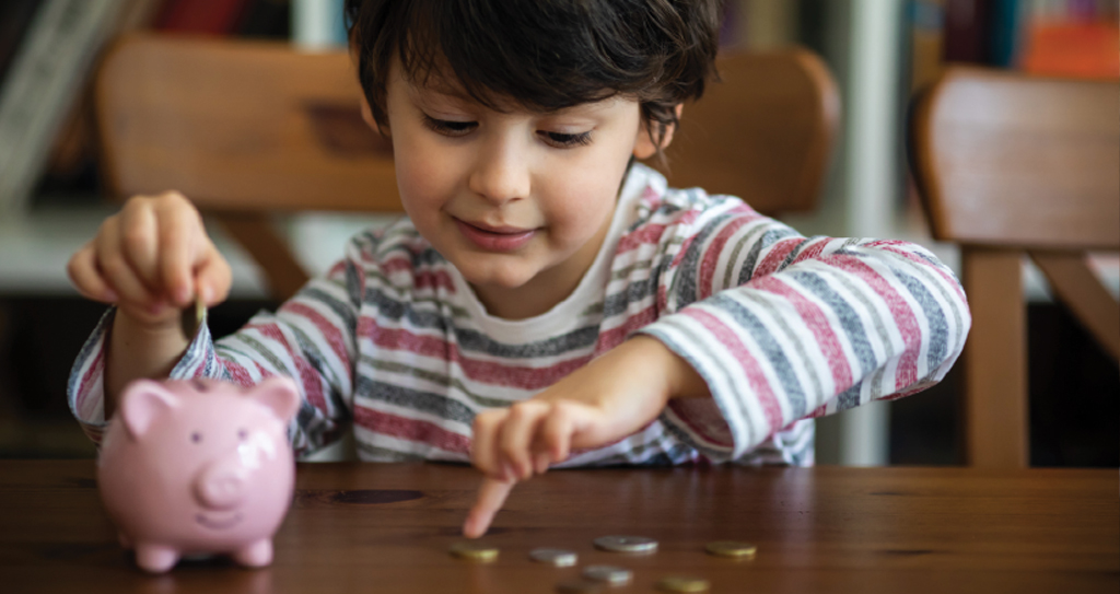 little boy counting pennies