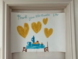 child's drawing of a big pancake breakfast on a table reads, "Thank you 1891 Financial Life"